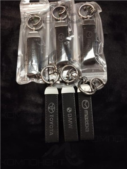 Брелок  марки автомобиля кожа черный металл вставка